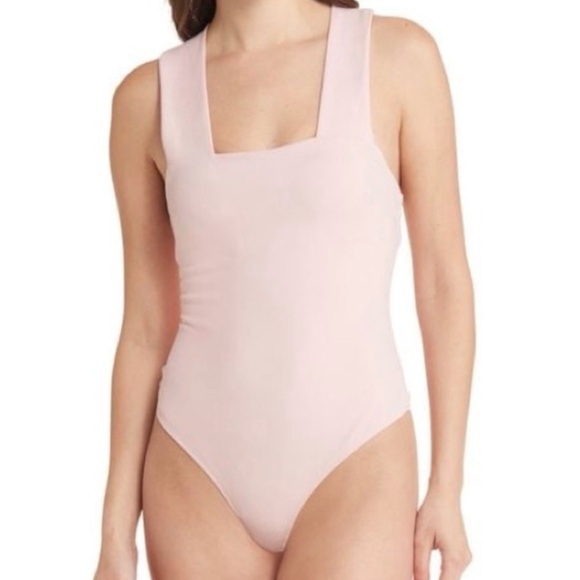 Free People Tops - Free People She’s So Sleek Light Pink Bodysuit